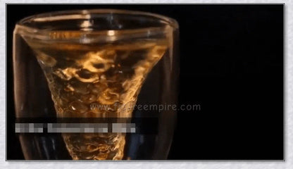 Transparent glass mug with a mermaid tail design, available in blue, green, pink, and yellow colors