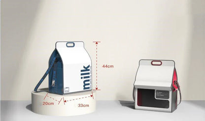 A stylish and practical one-shoulder handbag in eggshell milk color, featuring a simple and sophisticated design for the modern cat lover.