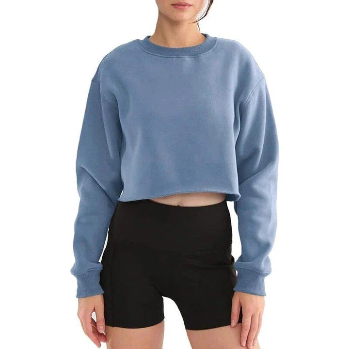 A cozy and stylish oversized sweatshirt for women made with a cotton-polyester blend fabric