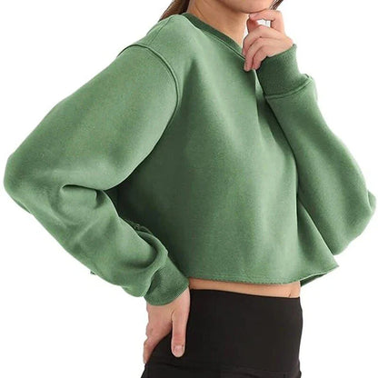 A cozy and stylish oversized sweatshirt for women made with a cotton-polyester blend fabric