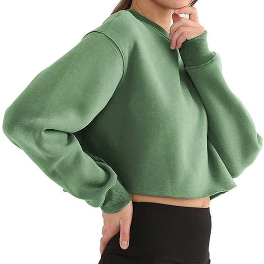 A cozy and stylish oversized sweatshirt for women made with a cotton-polyester blend fabric