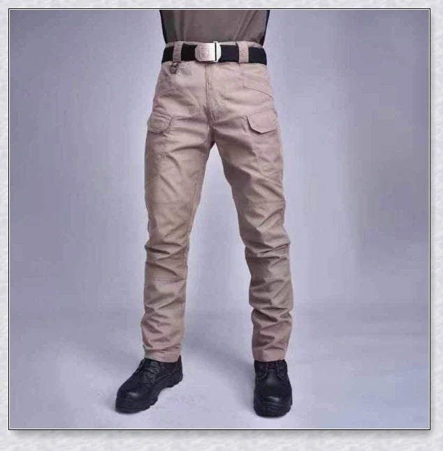 Tactical Waterproof Pants in various colors, featuring multiple pockets and ergonomic design for outdoor activities.