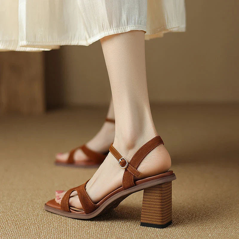 Chic open-toe leather sandals with a chunky 2-inch square heel, offering a stylish and comfortable design for summer fashion