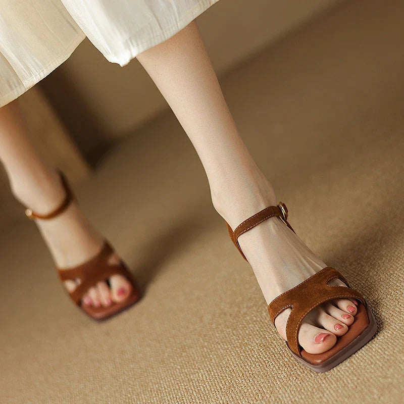 Chic open-toe leather sandals with a chunky 2-inch square heel, offering a stylish and comfortable design for summer fashion