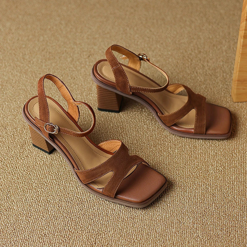 Chic open-toe leather sandals with a chunky 2-inch square heel, offering a stylish and comfortable design for summer fashion