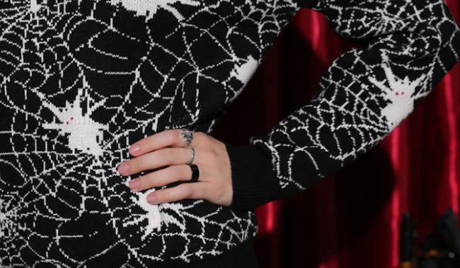 A cozy and comfortable black Halloween sweater with a unique 3D spider design, perfect for costume parties and autumn celebrations.