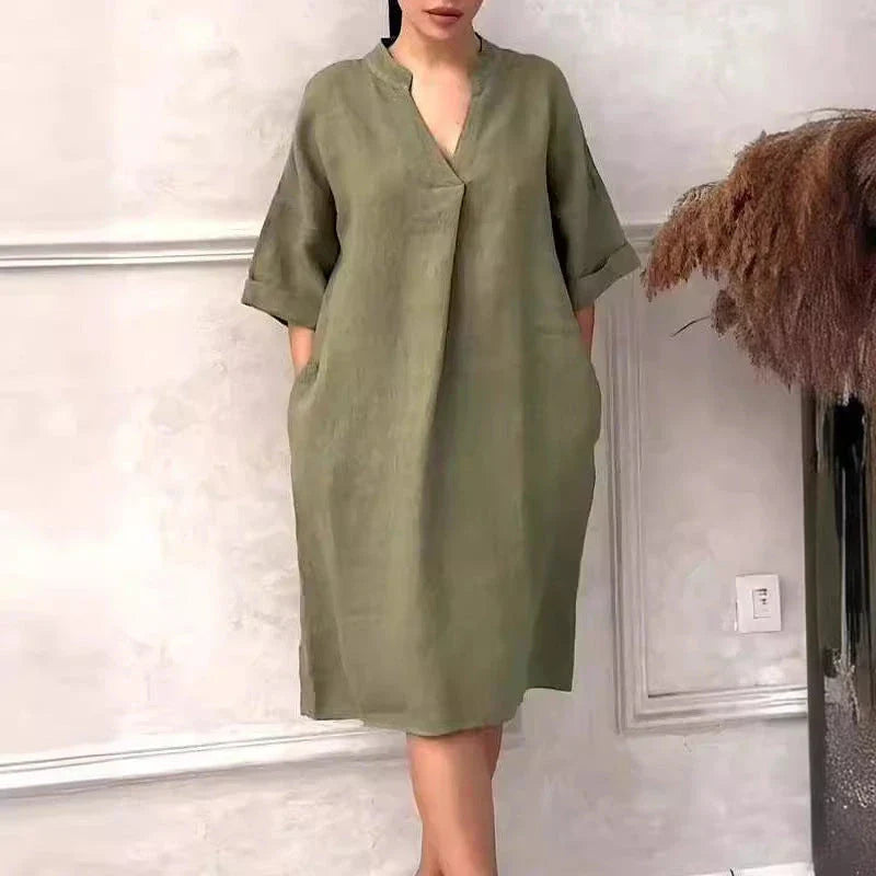 A fashion cotton linen dress for women with a v-neck and loose, plus size design in various colors