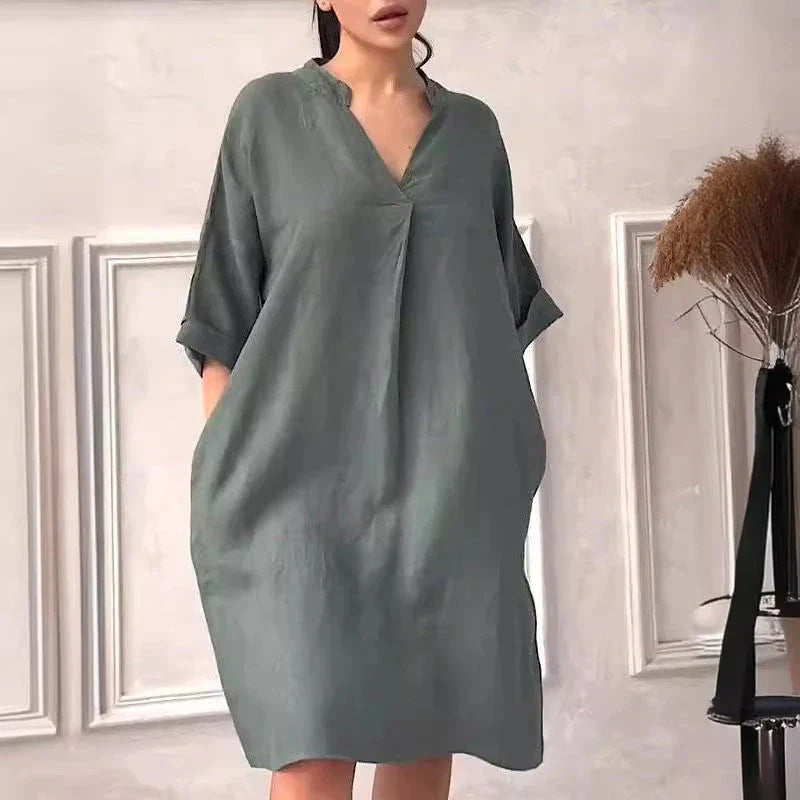 A fashion cotton linen dress for women with a v-neck and loose, plus size design in various colors