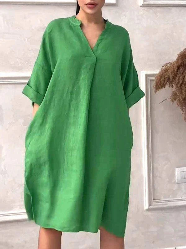 A fashion cotton linen dress for women with a v-neck and loose, plus size design in various colors