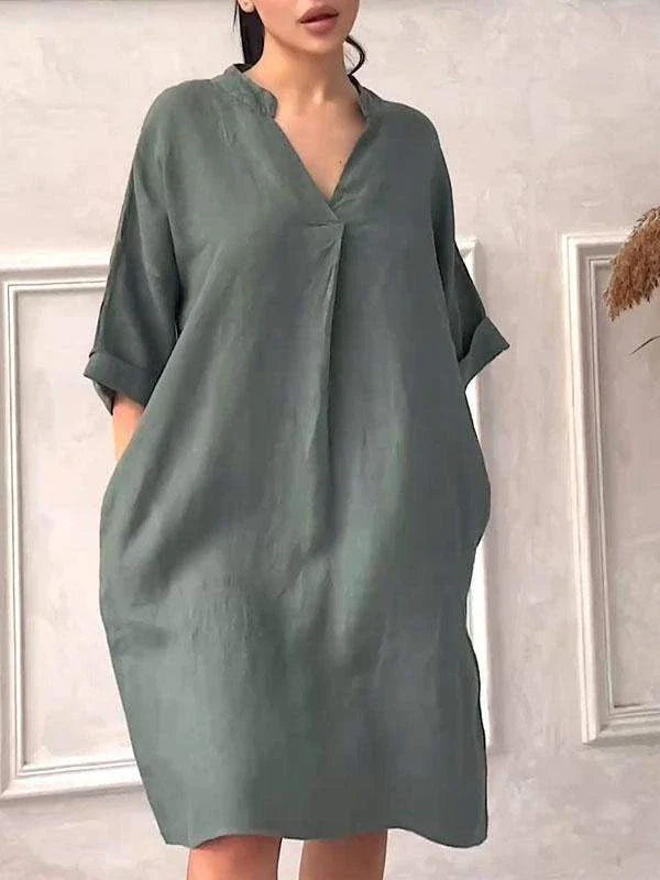 A fashion cotton linen dress for women with a v-neck and loose, plus size design in various colors