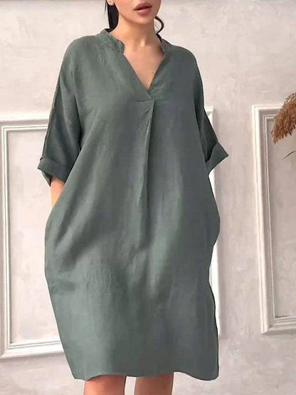 A fashion cotton linen dress for women with a v-neck and loose, plus size design in various colors