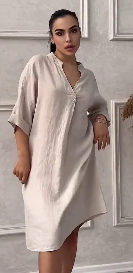 A fashion cotton linen dress for women with a v-neck and loose, plus size design in various colors