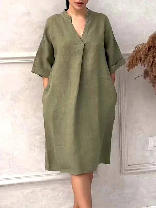 A fashion cotton linen dress for women with a v-neck and loose, plus size design in various colors