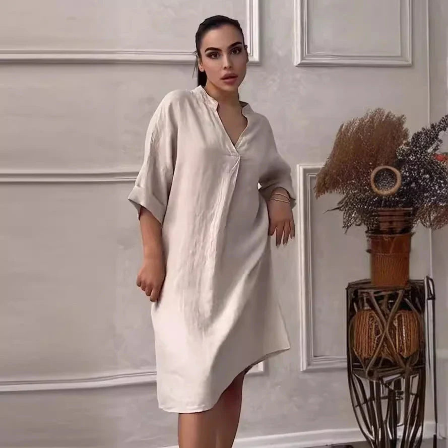 A fashion cotton linen dress for women with a v-neck and loose, plus size design in various colors