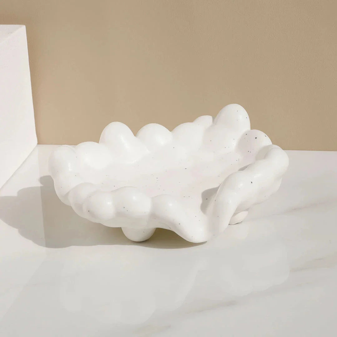 Ceramic soap dish with a whimsical cloud design, perfect for enhancing bathroom decor
