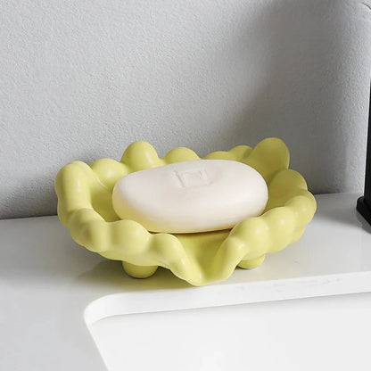 Ceramic soap dish with a whimsical cloud design, perfect for enhancing bathroom decor
