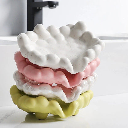 Ceramic soap dish with a whimsical cloud design, perfect for enhancing bathroom decor