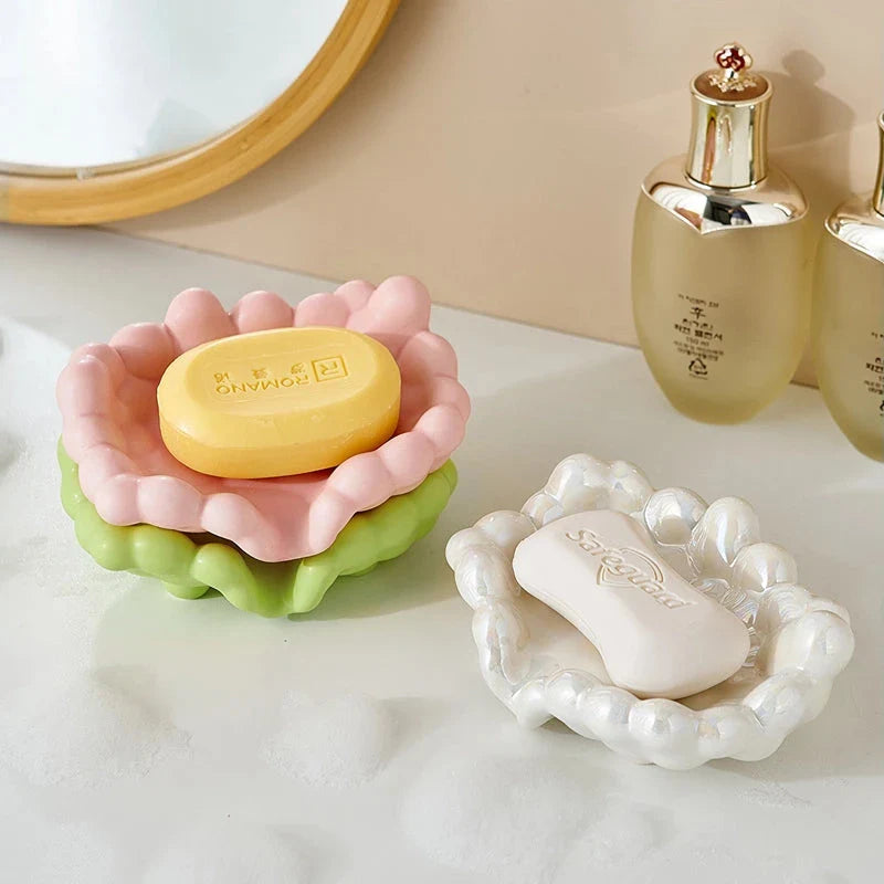 Ceramic soap dish with a whimsical cloud design, perfect for enhancing bathroom decor