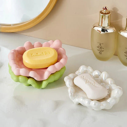 Ceramic soap dish with a whimsical cloud design, perfect for enhancing bathroom decor