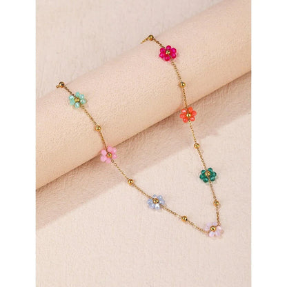 Colorful flower beaded stainless steel bracelet with vibrant beads and adjustable chain link design