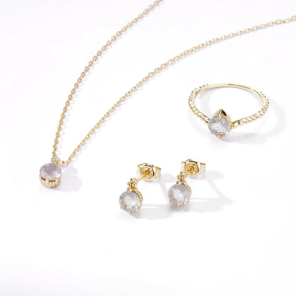 Pair of natural elongated stone earrings with a geometric design, crafted from silver and white crystal