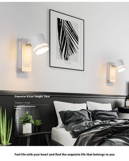 A modern, minimalist LED reading lamp with a Nordic-inspired design, perfect for bedside use in a hotel or home bedroom.