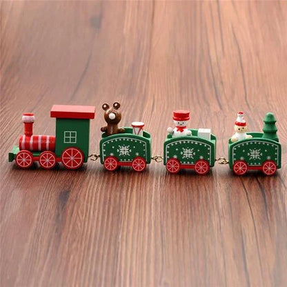 4 mini wooden train toys in red, white, and green colors with festive passengers, perfect for holiday decoration