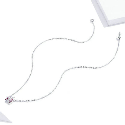 A sterling silver necklace featuring a charming ladybug design, with an adjustable chain for a customized fit.