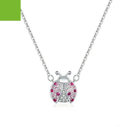 A sterling silver necklace featuring a charming ladybug design, with an adjustable chain for a customized fit.