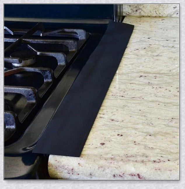 Stove Counter Gap Covers in different colors - clear, black, and white silicone covers that fill the space between stove and counter.