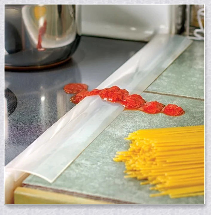 Stove Counter Gap Covers in different colors - clear, black, and white silicone covers that fill the space between stove and counter.