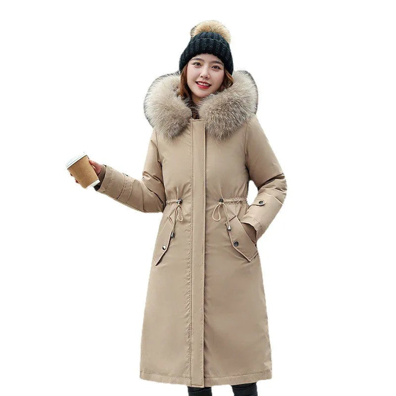 Long white women's fleece trench coat with down cotton padding on a hanger.