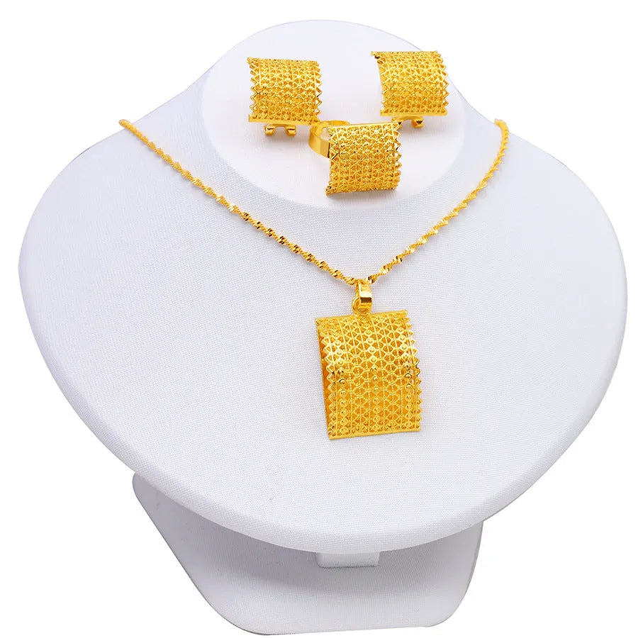Gold colour bridal jewellery set with necklace, earrings and ring combination