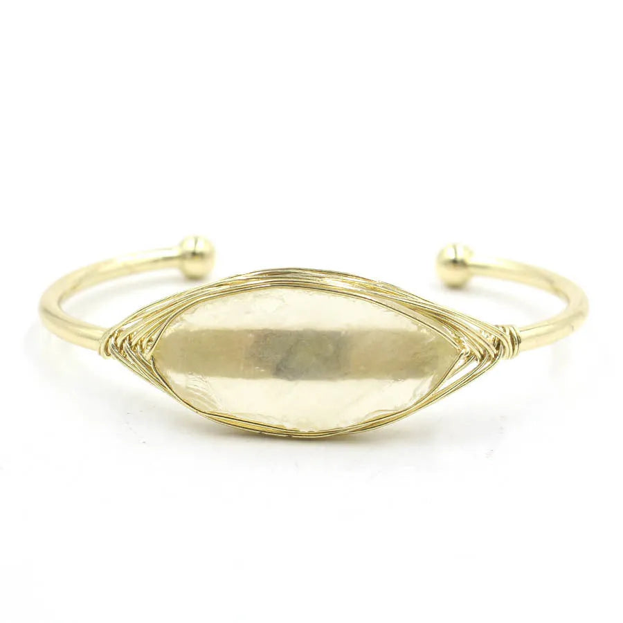 Natural raw gemstone bracelet with 8mm rough crystal beads in ethnic style, shown on wrist.