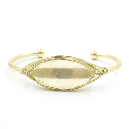 Natural raw gemstone bracelet with 8mm rough crystal beads in ethnic style, shown on wrist.
