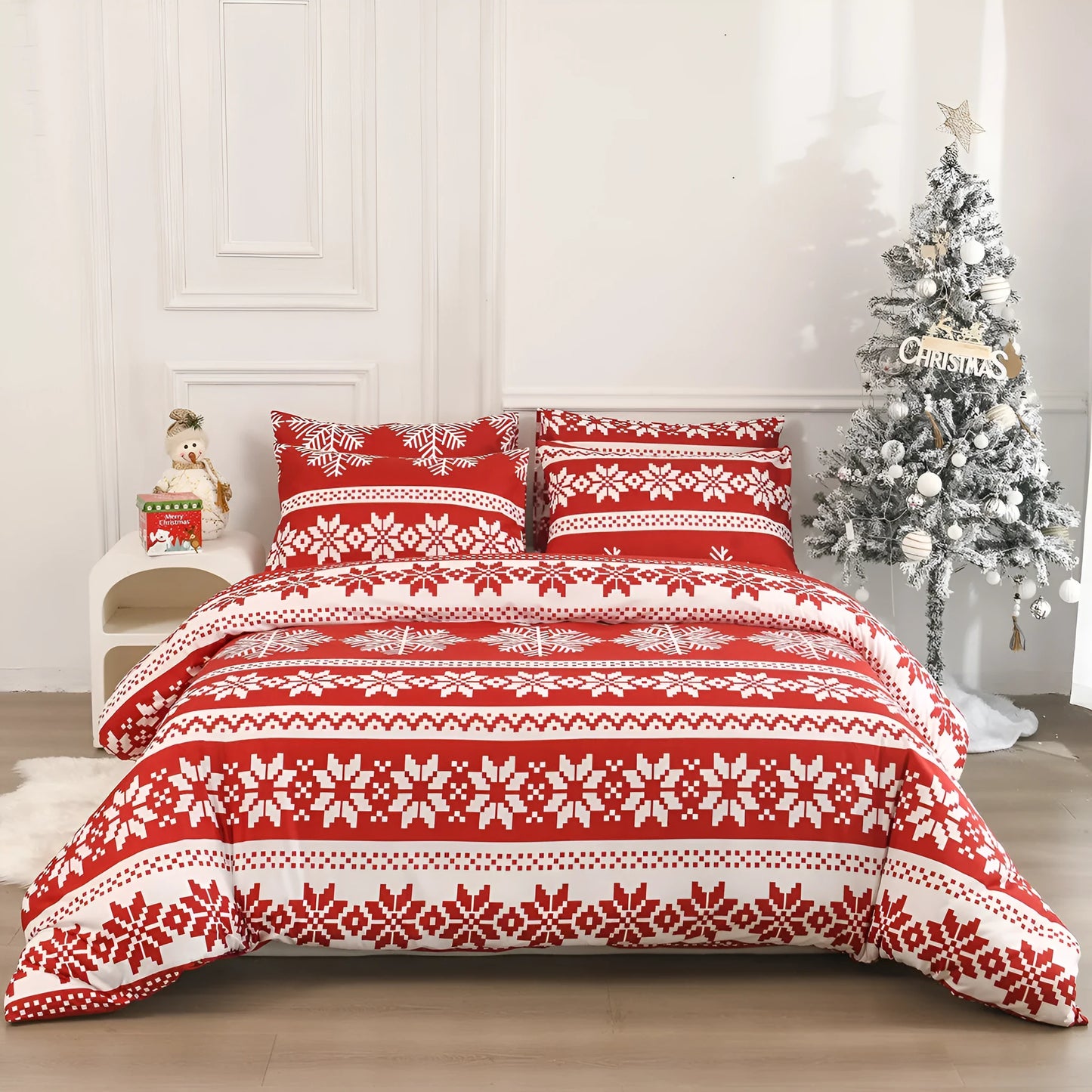 Red Winter Sleepers patterned three-piece bed set with quilt cover and pillowcases on a bed.