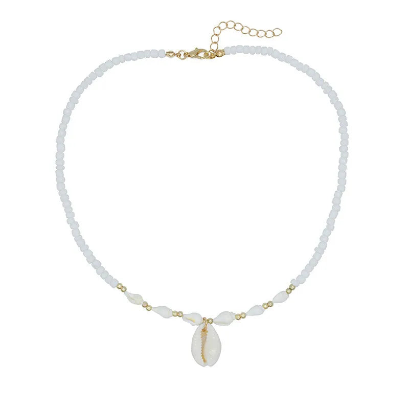 White shell necklace with conch pendant on 45cm chain, electroplated finish.