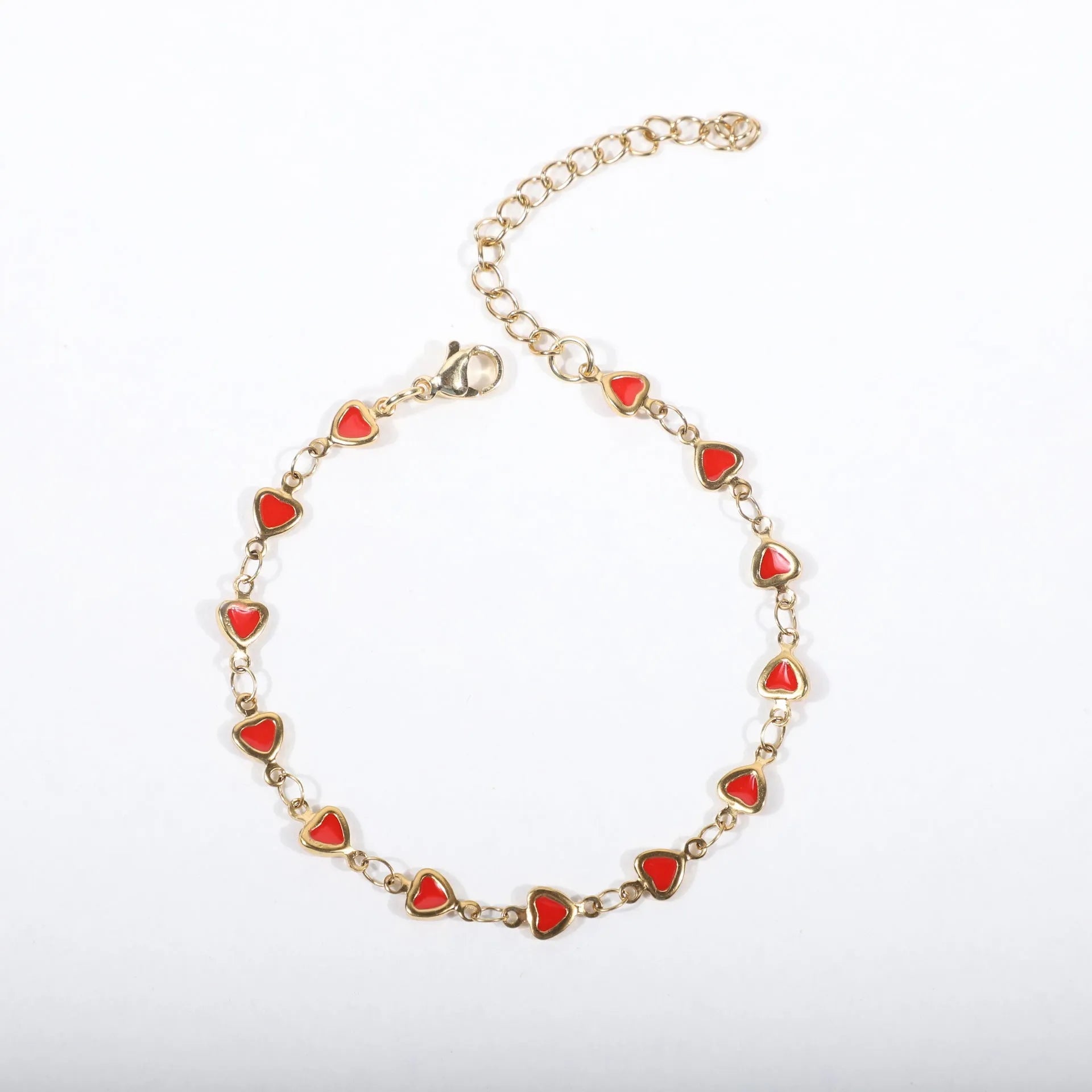 Stainless steel heart bracelet with 18K gold plating in multiple colours showing adjustable 17+5cm length