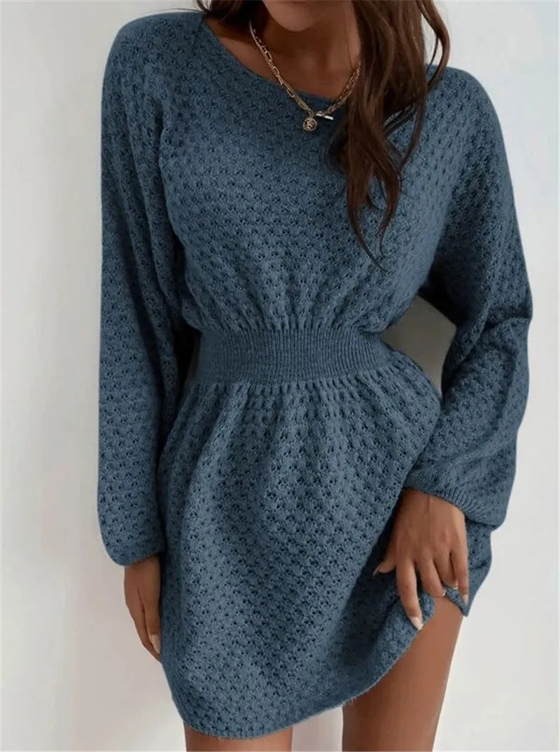 Blue women's dress with hand-crocheted floral details, fitted waist, and 65cm length