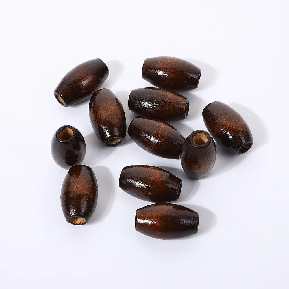Dark coffee coloured oval wooden beads with M-shaped design, 25mm size with 6mm hole