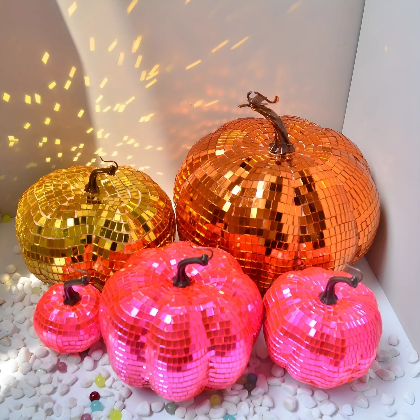 A Chinese-style embroidered glass pumpkin Halloween decoration in various sizes.