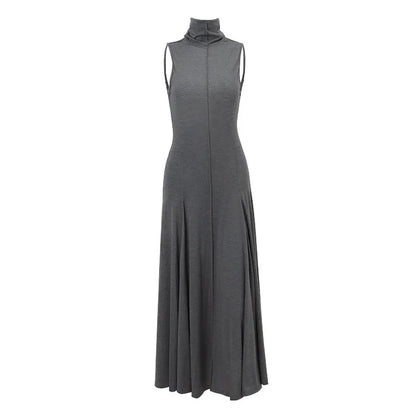 Grey women's slim-fit cotton dress with a half turtleneck neckline, backless design, high waist, and sleeveless cut.