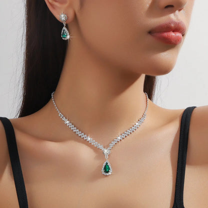Rhinestone claw chain necklace and earrings set with water drop shaped pendants