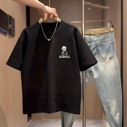 Men's black cotton t-shirt with a cartoon print, showing the slim fit and short sleeve design.