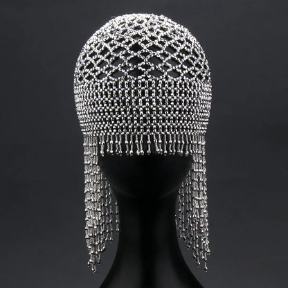 Silver and black belly dance hat with handmade beading and long tassels for performance hair ornamentation