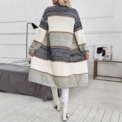 Grey striped women's knitted cardigan with long sleeves and loose fit design