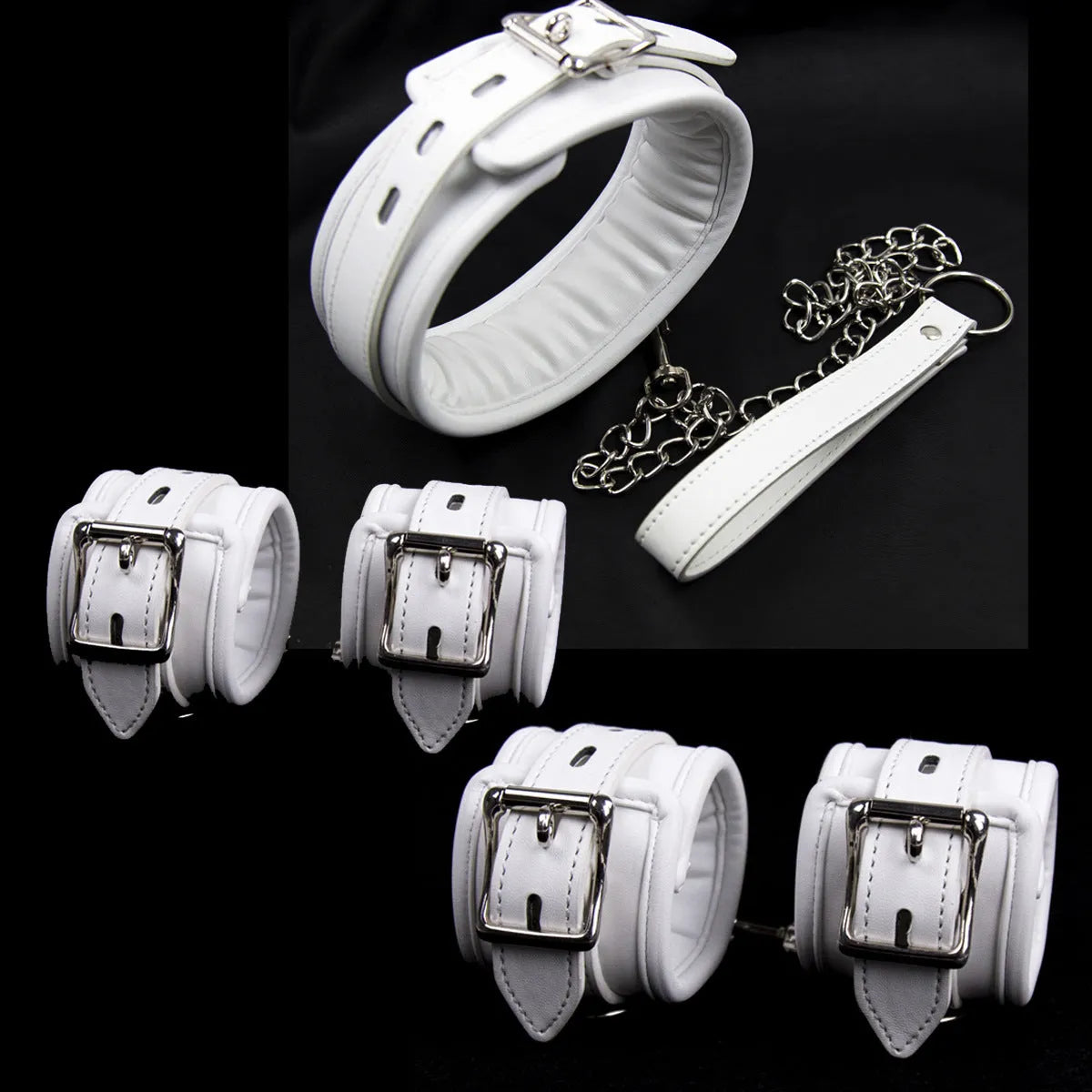 White PU sponge bondage set showing handcuffs, footcuffs and neck cuff for comfortable restraint