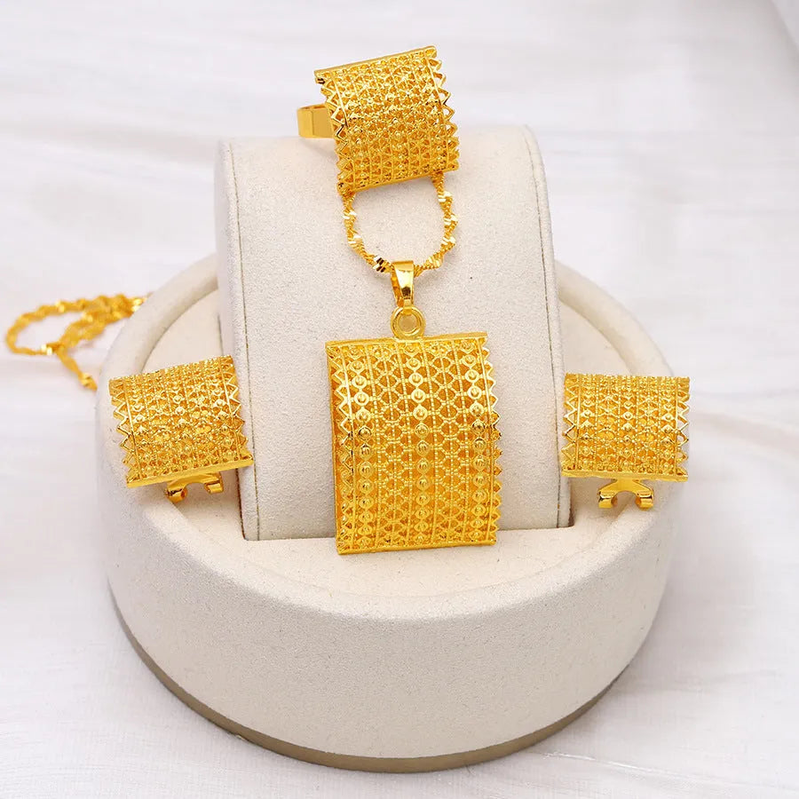 Gold colour bridal jewellery set with necklace, earrings and ring combination