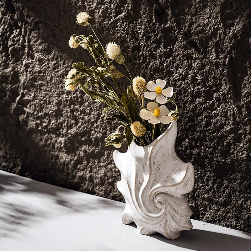French art ceramic vase with coloured glaze in a European retro style, shown empty on a wooden surface.
