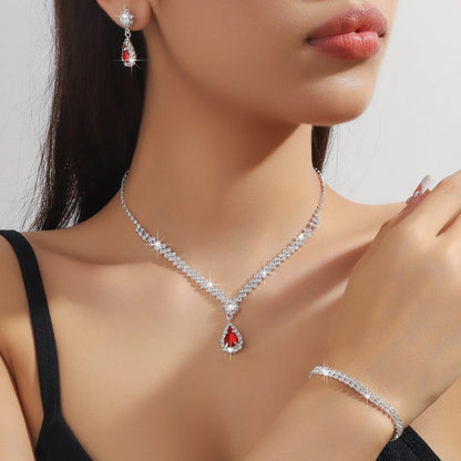 Rhinestone claw chain necklace and earrings set with water drop shaped pendants